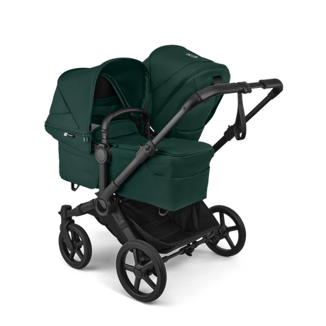Parently-hyra_syskonvagn_Sverige-donkey-6-double-bassinet-seat-fw-black-fern-green-complete-sideshot_NA